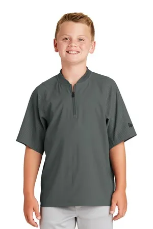 YNEA600 New Era Youth Cage Short Sleeve 1/4-Zip Jacket.